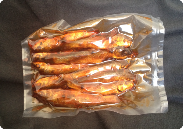 Shrink wrapped fish